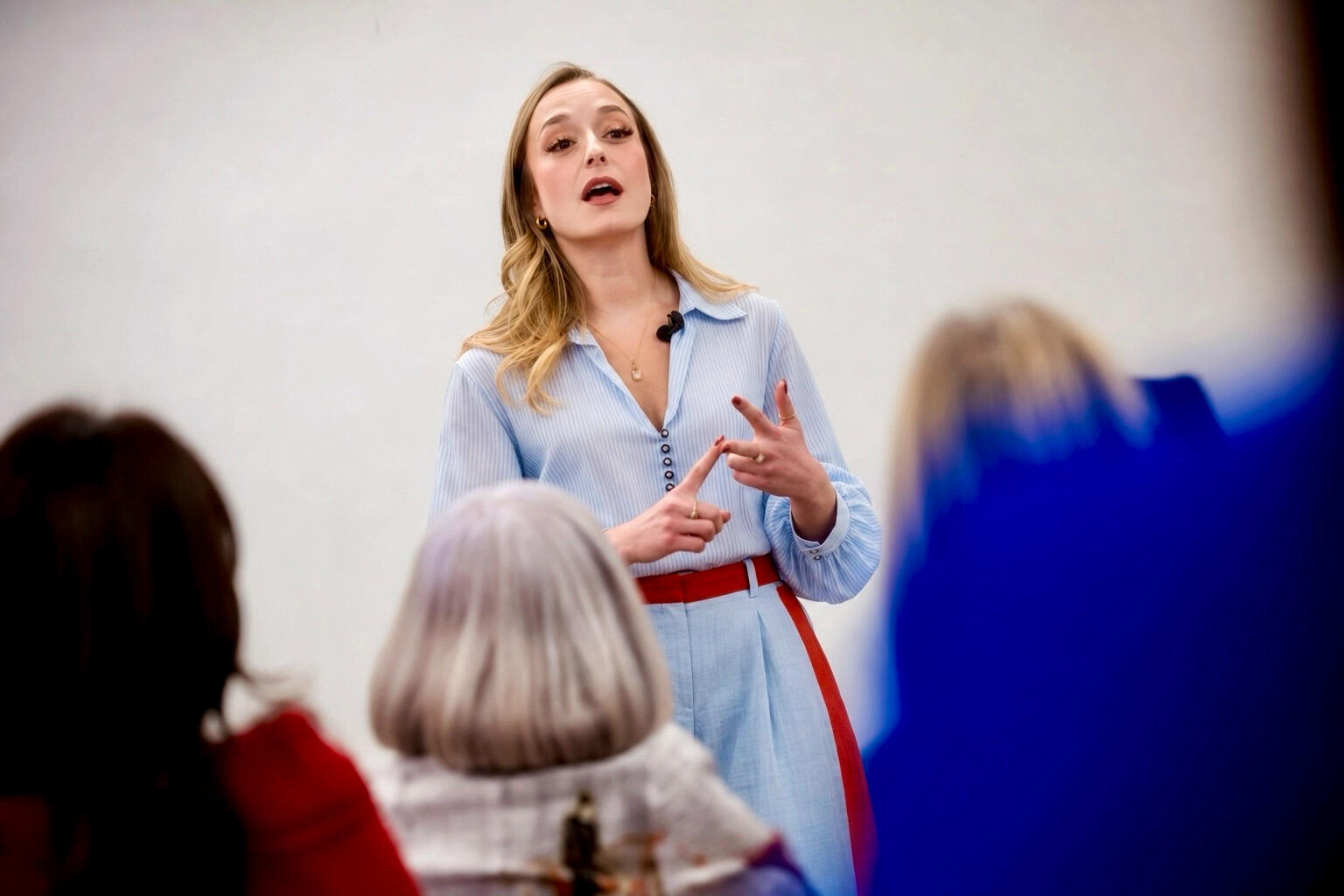 Stefanie Pinsley speaking to an audience during a workshop.